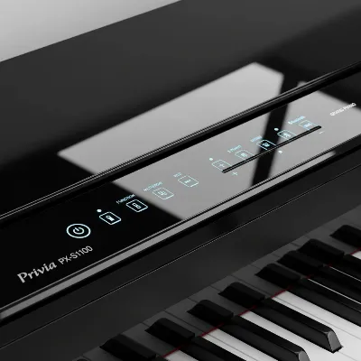 Close-up of Casio Privia PX-S1100's sleek control panel with illuminated touch sensors.