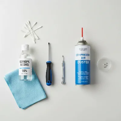 Essential tools for DIY digital piano sticky key repair including screwdrivers, alcohol, and microfiber cloth